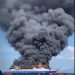 Kapal Motor (KM) Barcelona 5 dilaporkan terbakar di perairan Pulau Talise, Minahasa Utara, Minggu siang (20/7). foto : istimewa